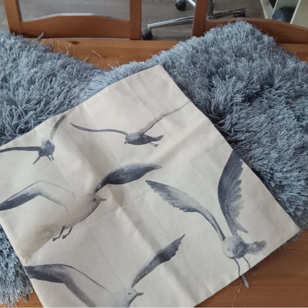 Two Shag pillow covers with sparkles and one bird pillow cover